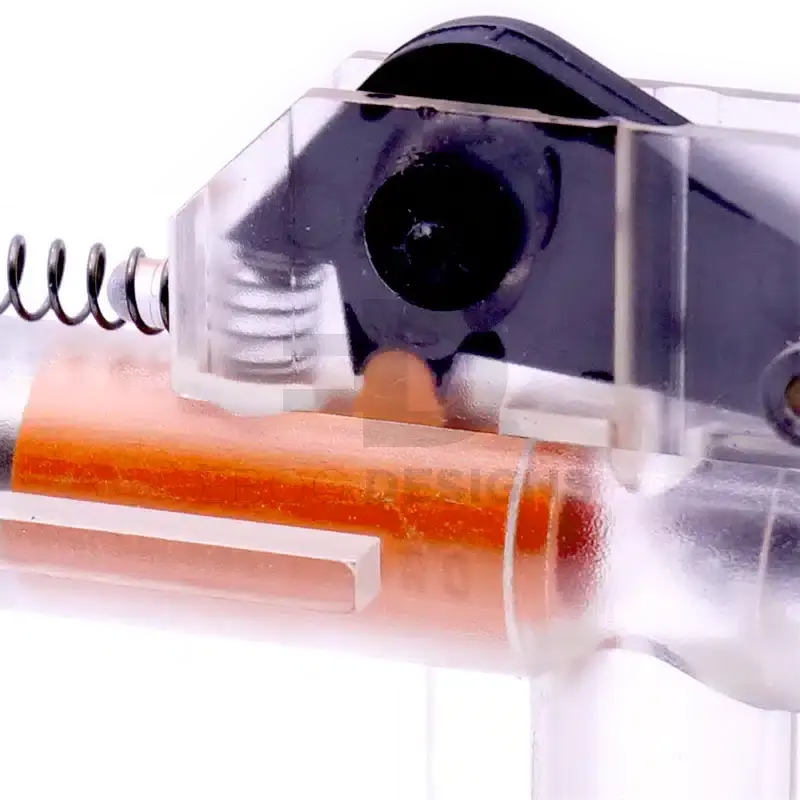 4uantum Friction Pro AEG bucking shown installed in a clear demonstration hop-up unit with the hop nub pressing down