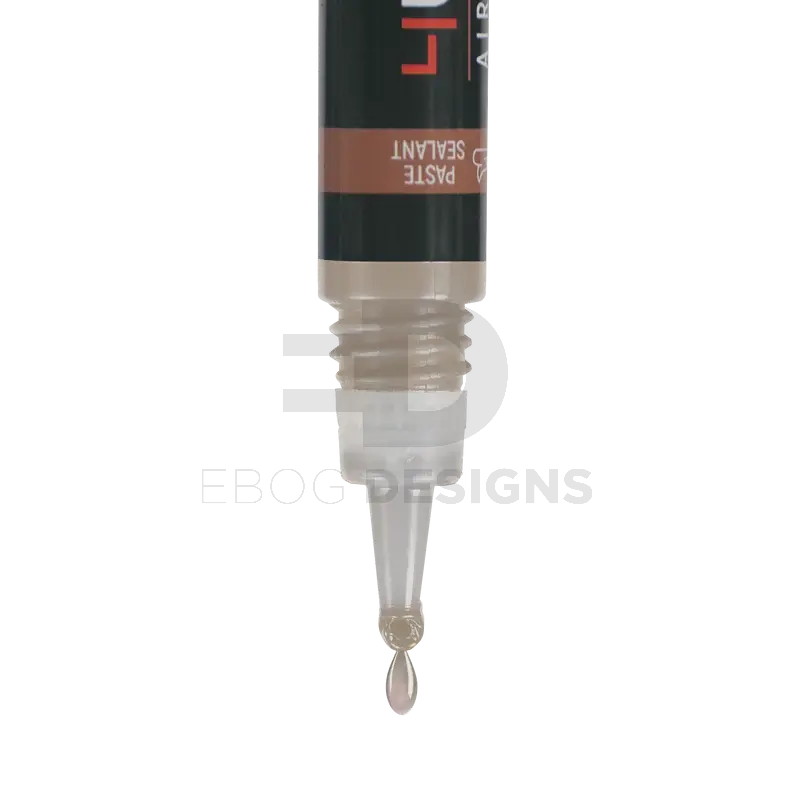4uantum High Viscosity Airtight Sealant precision nozzle close-up dispensing a beige paste drop