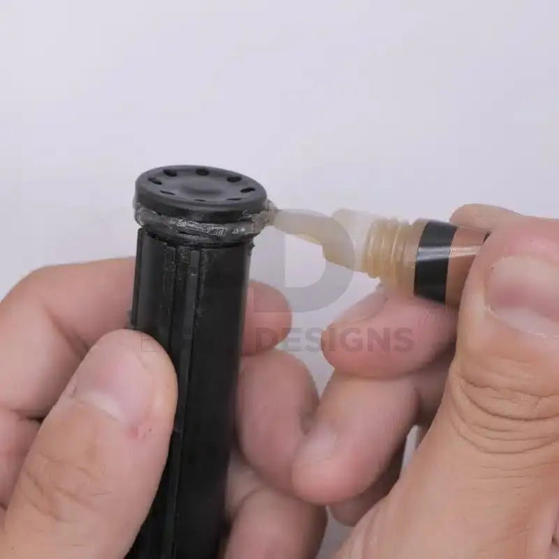 4uantum High Viscosity Airtight Sealant applied around the valve head of a gas blowback magazine
