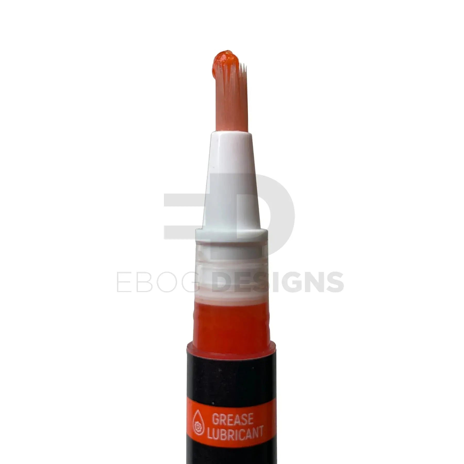 4uantum Performance Lubricant Pen close-up of the brush applicator tip loaded with orange grease