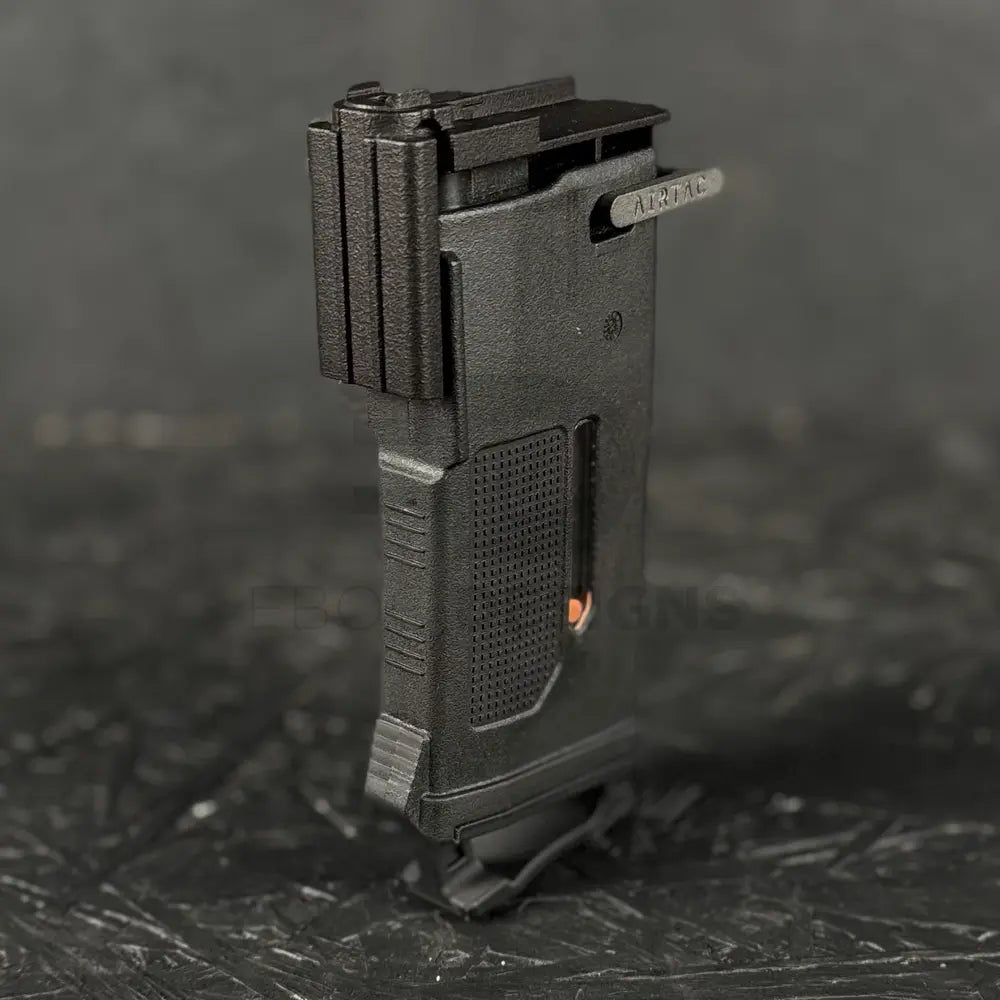 AirTac Wolverine Gen-12 M4 adapter, 3/4 view showing the M4 magazine feed interface