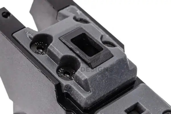 FCW SAIGA drum magazine adaptor for the TM SAIGA 12, close-up of the feed-port and gas-routing detail