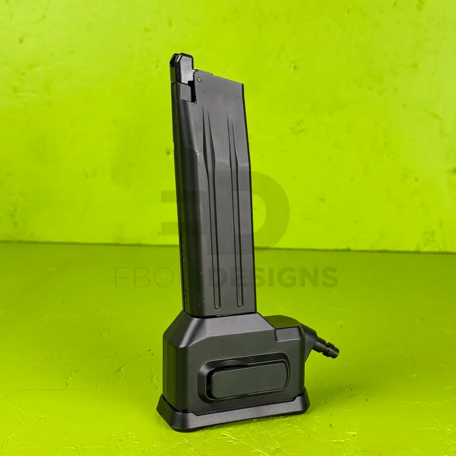 Ebog Designs Hi-Capa to M4 HPA adapter with a Hi-Capa GBB magazine seated into the adapter base