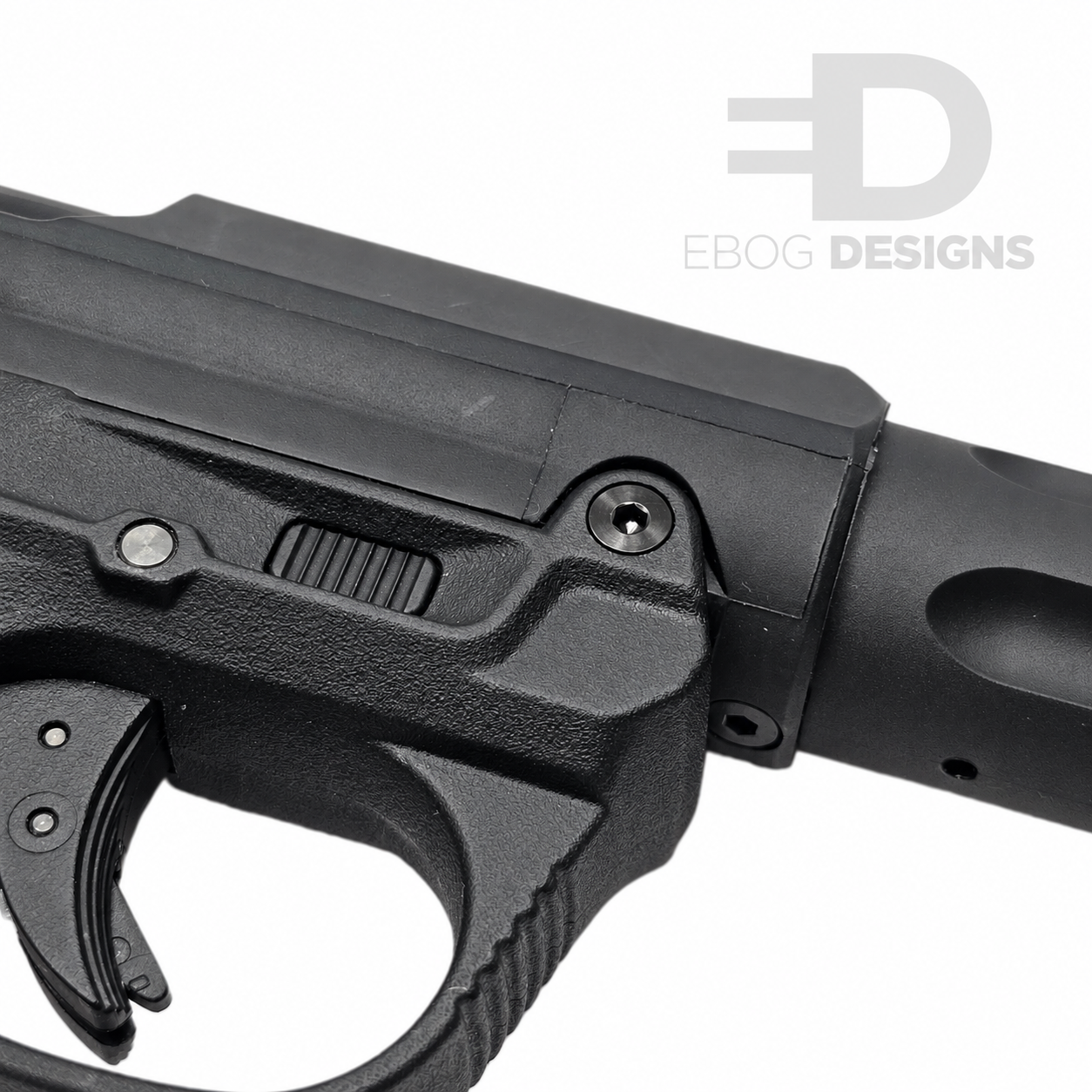 Ebog Designs AAP-01 XL trigger housing side screw fitted to the side of an AAP-01 trigger housing, black